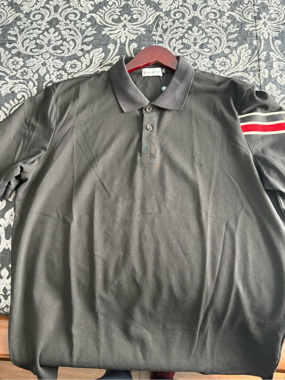Moncler Black Polo with Red and White Sleeve Stripe